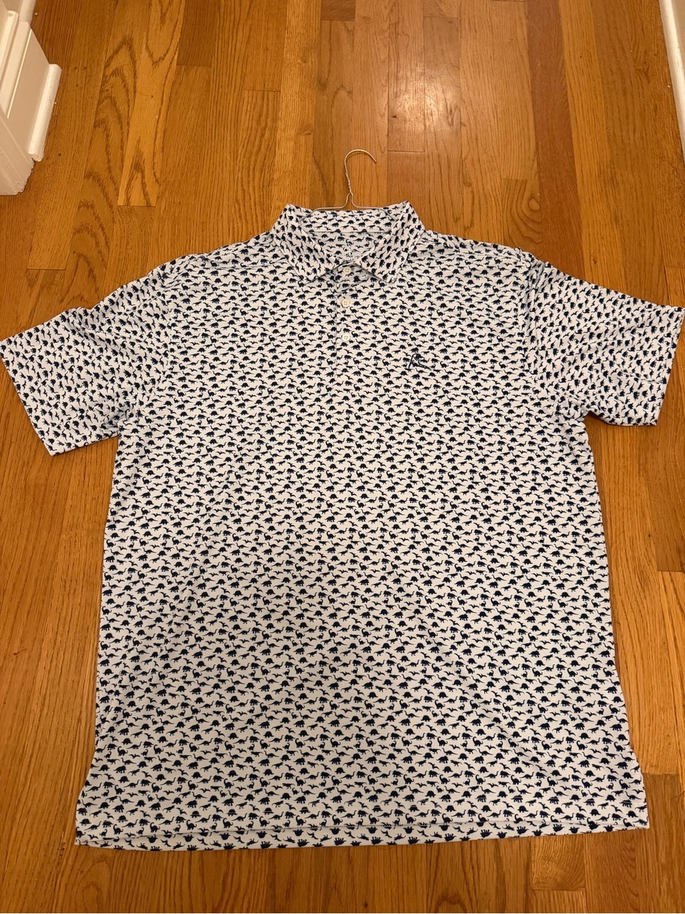 Rhoback White “Dinosaur” Polo in excellent condition